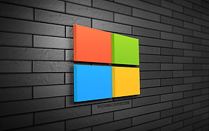 Microsoft Windows 11 Logo on Dark Brick Wall HD wallpaper