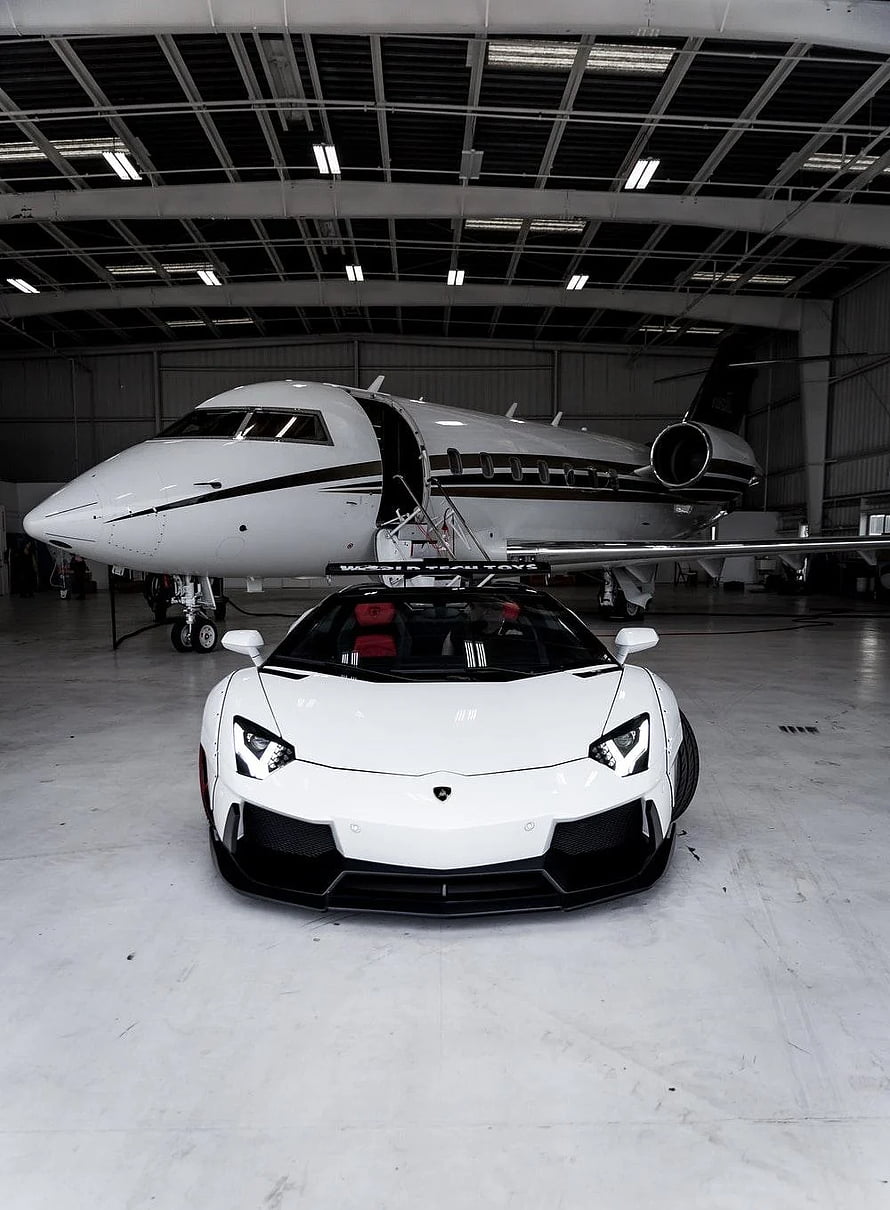White Lamborghini Aventador and Private Jet in Hangar HD phone wallpaper