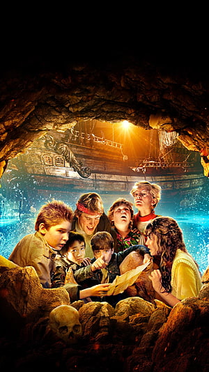 The Goonies movie poster featuring the young adventure crew exploring a treasure cave with a pirate ship in the background HD phone wallpaper