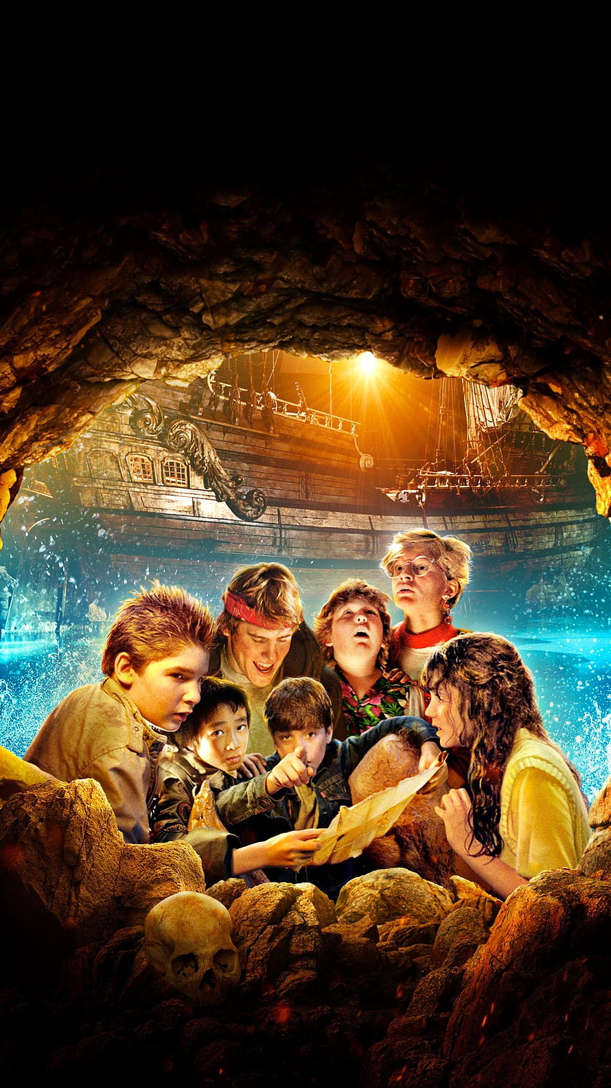 The Goonies movie poster featuring the young adventure crew exploring a treasure cave with a pirate ship in the background HD phone wallpaper