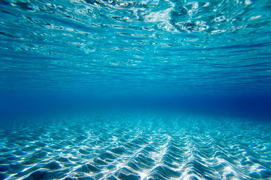 Underwater Ocean Floor With Sunlight Rays And Sand Ripples HD wallpaper
