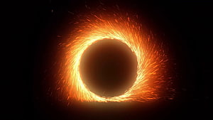 Fiery Orange Fire Ring Swirling in Dark Space with Sparks HD wallpaper