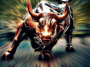 Aggressive Bronze Bull Statue Charging Forward With Dramatic Motion Blur Background HD wallpaper