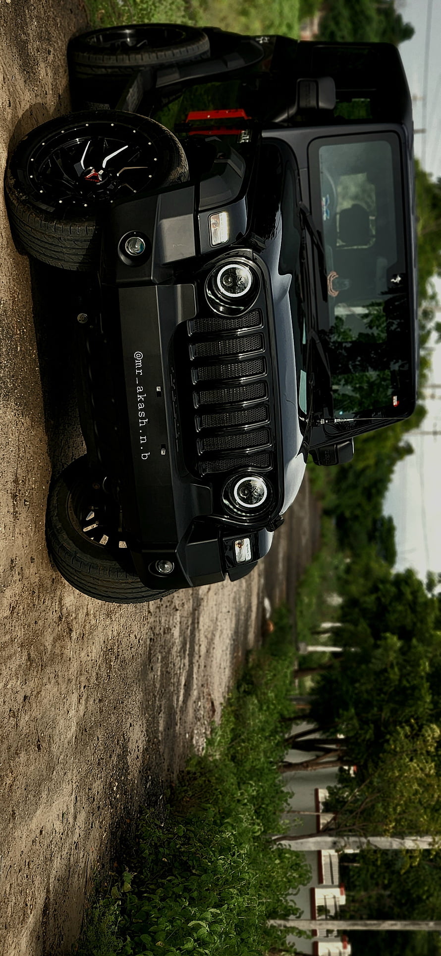 Black Jeep Wrangler with Custom Alloy Wheels on a Dirt Road HD phone wallpaper