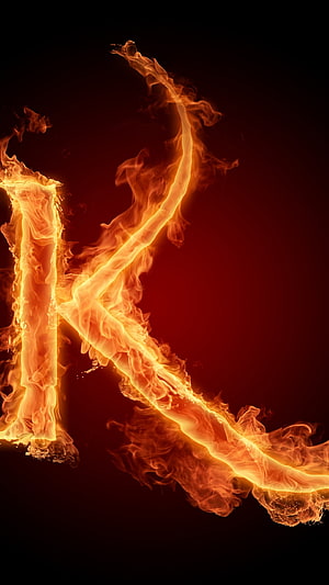 Blazing Letter K Rendered in Vivid Orange Flames Against a Deep Red Gradient Background HD phone wallpaper