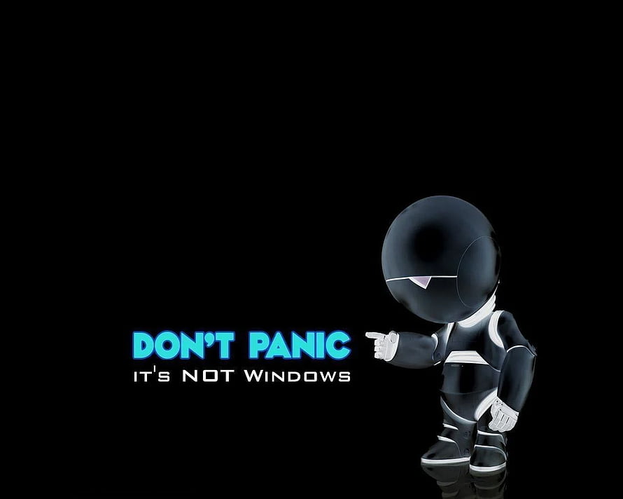 Tux the Linux Penguin Mascot Pointing at Don't Panic It's Not Windows Text on Black Background HD wallpaper