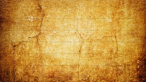 Aged Papyrus Texture with Cracked Surface and Warm Golden Tones HD wallpaper