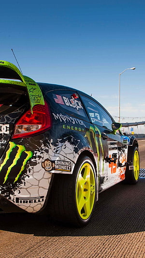Ken Block Ford Fiesta Rally Car with Monster Energy Livery and Neon Yellow Wheels HD phone wallpaper