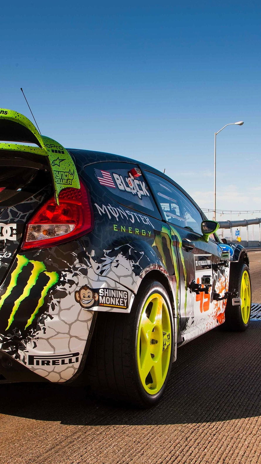 Ken Block Ford Fiesta Rally Car with Monster Energy Livery and Neon Yellow Wheels HD phone wallpaper