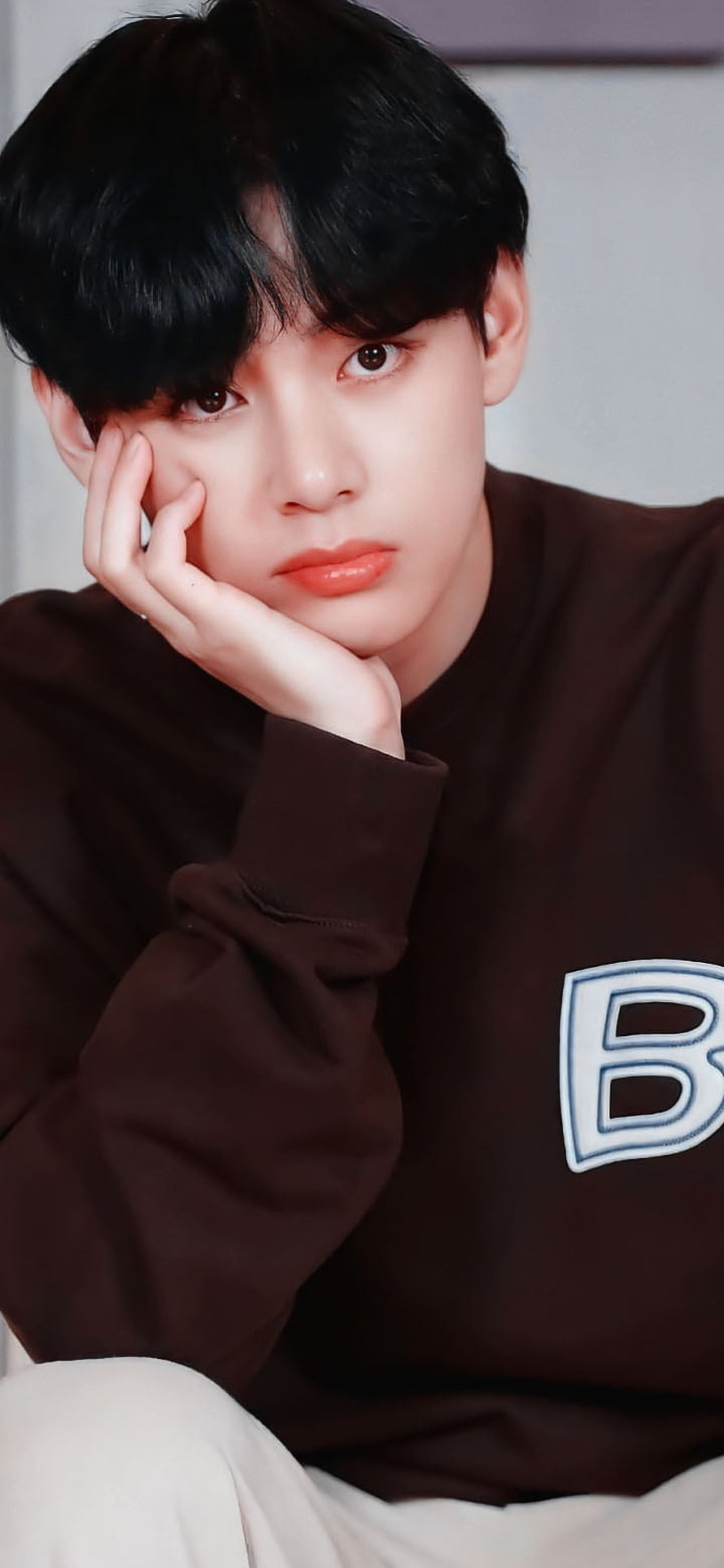 Kim Taehyung Portrait in Brown Sweatshirt with Soft Studio Lighting HD phone wallpaper