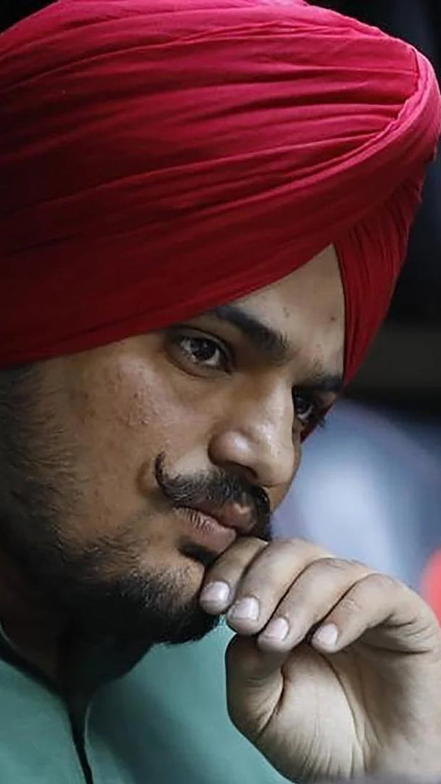 Sidhu Moose Wala Portrait in Red Turban with Contemplative Expression HD phone wallpaper