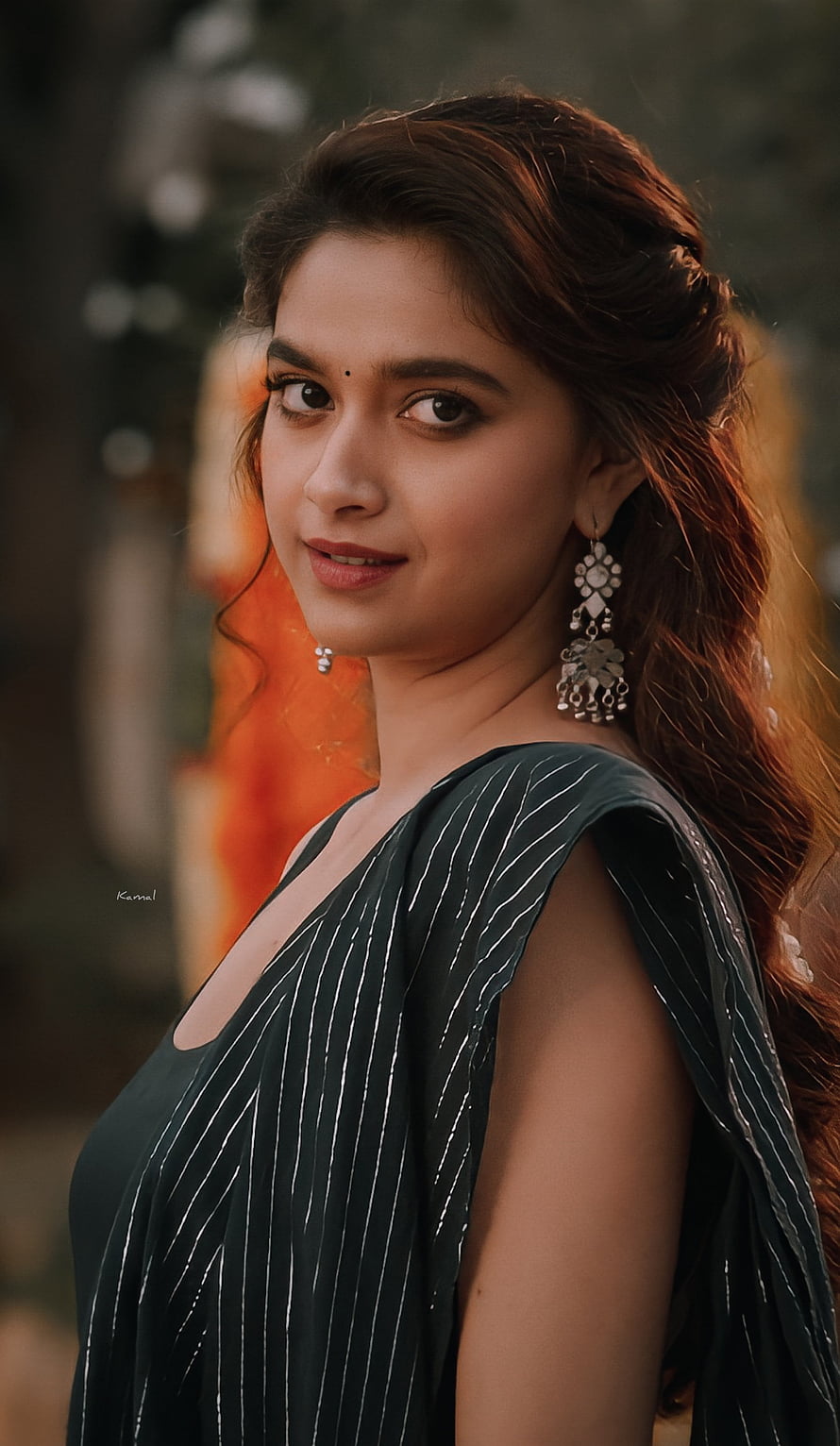 Adah Sharma in a stylish black striped saree with traditional silver jhumka earrings and a gentle smile HD phone wallpaper