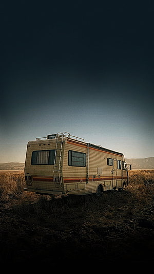 Breaking Bad RV Parked in a Dry Grassland Under a Dark Moody Sky HD phone wallpaper