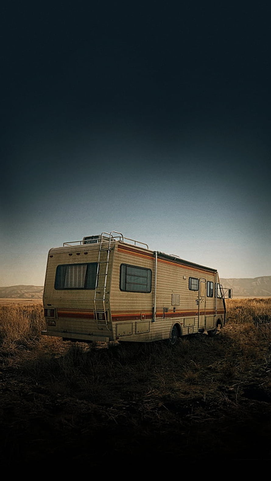 Breaking Bad RV Parked in a Dry Grassland Under a Dark Moody Sky HD phone wallpaper