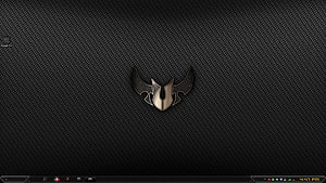 Metallic winged emblem on dark carbon fiber texture background HD wallpaper