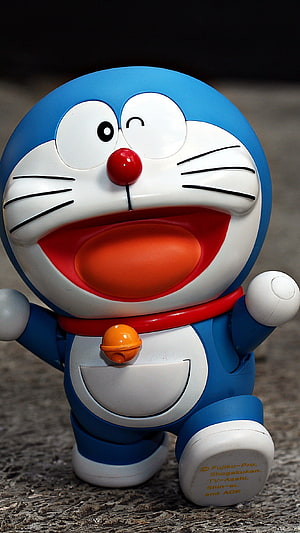 Doraemon Winking Toy Figure Close-Up Wallpaper HD phone wallpaper