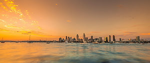 San Diego Skyline at Sunset with Boats on the Water HD wallpaper