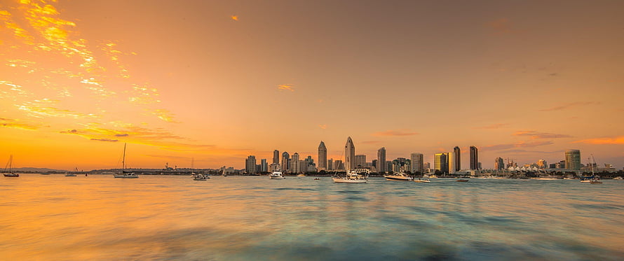 San Diego Skyline at Sunset with Boats on the Water HD wallpaper