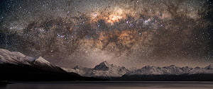 Stunning Milky Way Galaxy Over Snow-Capped Mountain Range and Lake Panorama HD wallpaper