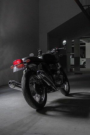 Royal Enfield Continental GT 650 Rear View in Dimly Lit Concrete Parking Garage HD phone wallpaper