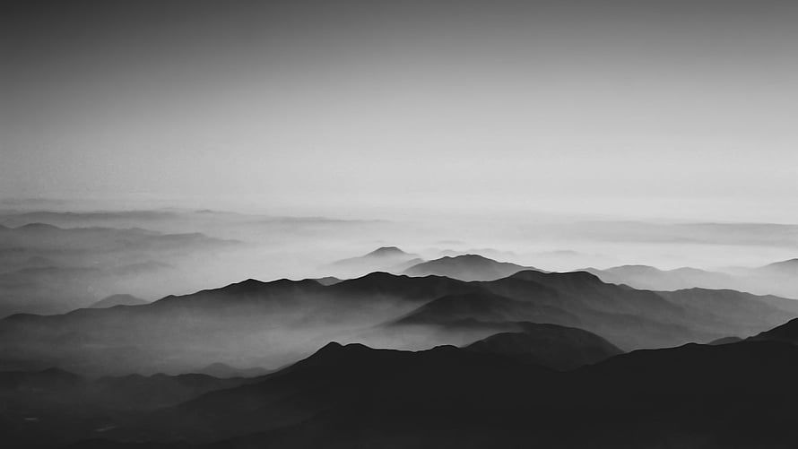Monochrome Mountain Ranges Shrouded in Mist and Fog HD wallpaper