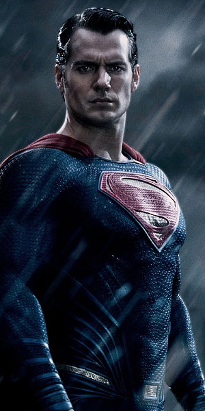 Henry Cavill as Superman in a dark textured suit with red cape and emblem, Superman, movie, confident . Batman v superman: dawn of justice, Superman movies, Superman henry cavill, Henry Cavill Superman HD phone wallpaper