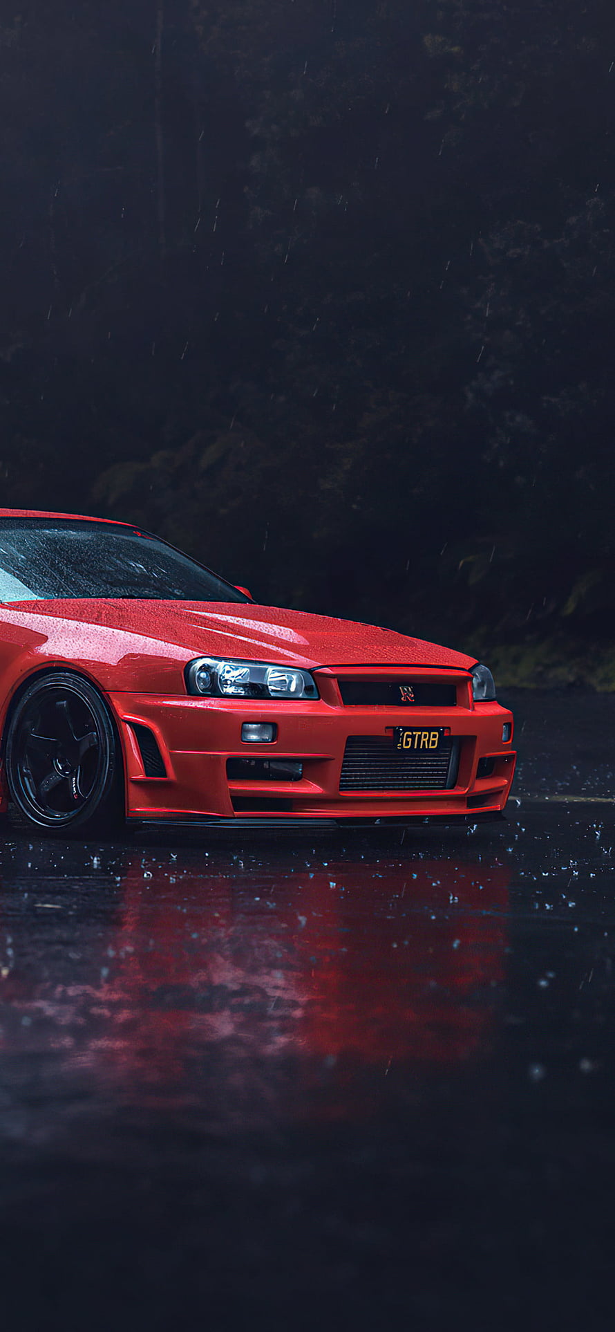 Red Nissan Skyline GT-R R34 parked on wet asphalt in the rain with reflections HD phone wallpaper
