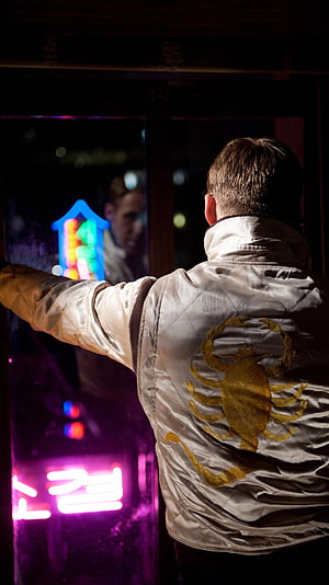 Ryan Gosling as the Driver in Drive Wearing Scorpion Jacket at Night HD phone wallpaper