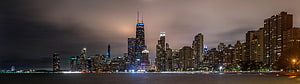 Chicago Skyline at Night with Lake Michigan and City Lights HD wallpaper
