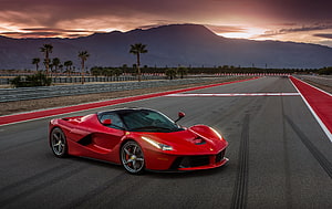 Red Ferrari LaFerrari Hypercar on a Desert Race Track at Sunset HD wallpaper