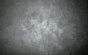 Dark Grey Concrete Texture with Subtle Light Reflections and Surface Stains HD wallpaper