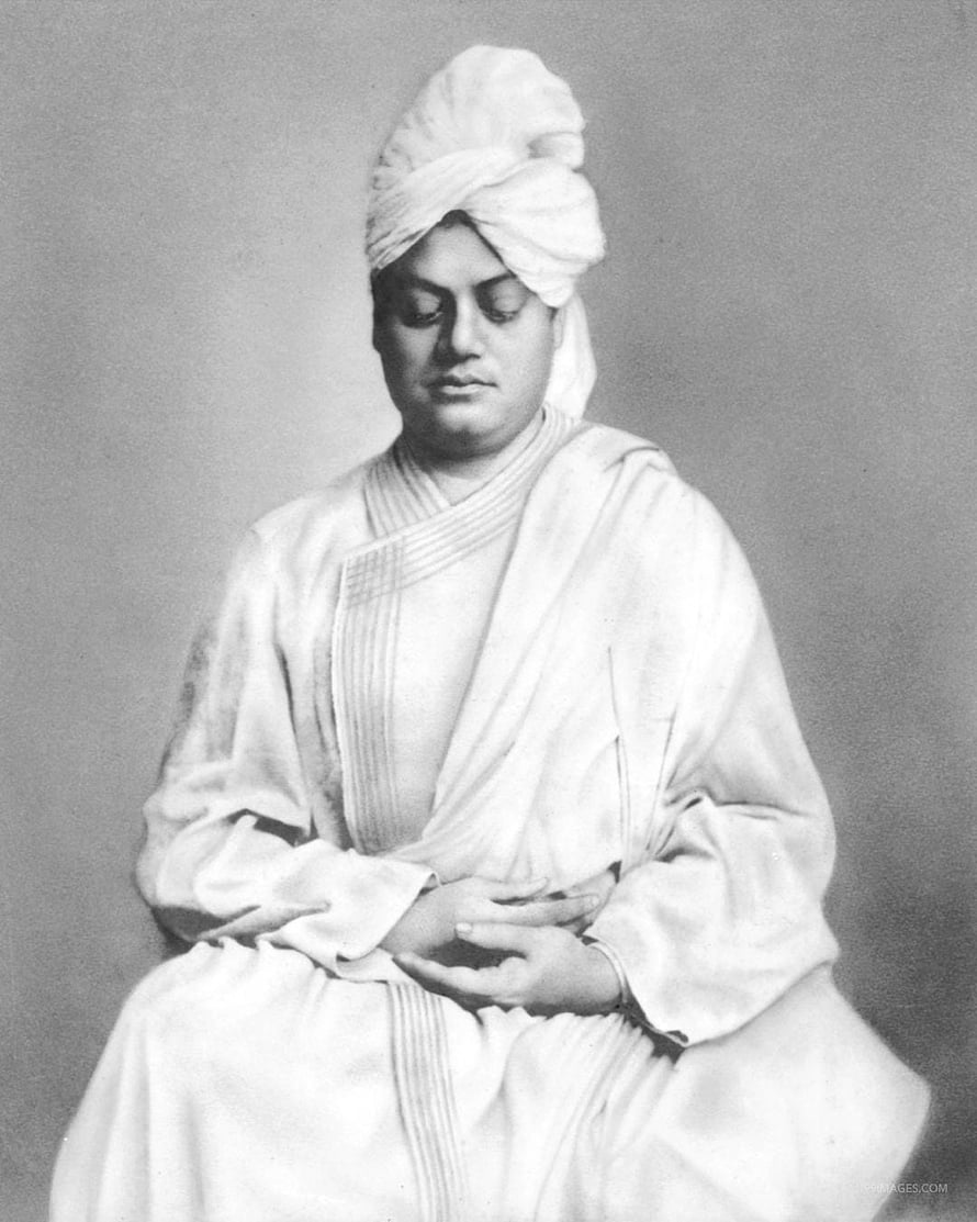 Swami Vivekananda in White Robes and Turban Seated in Contemplative Pose HD phone wallpaper