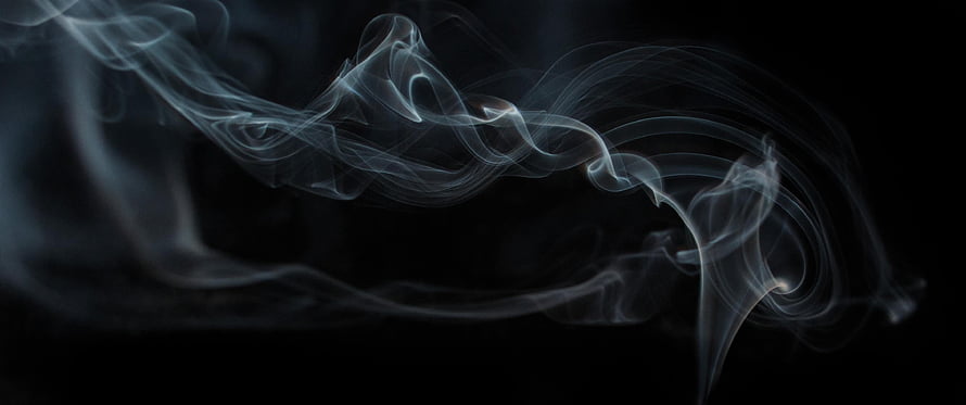 Abstract White Smoke Swirling Against a Dark Black Background HD wallpaper