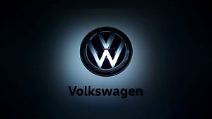 Volkswagen Logo Wallpaper - Sleek VW Emblem on Dark Blue Background HD wallpaper