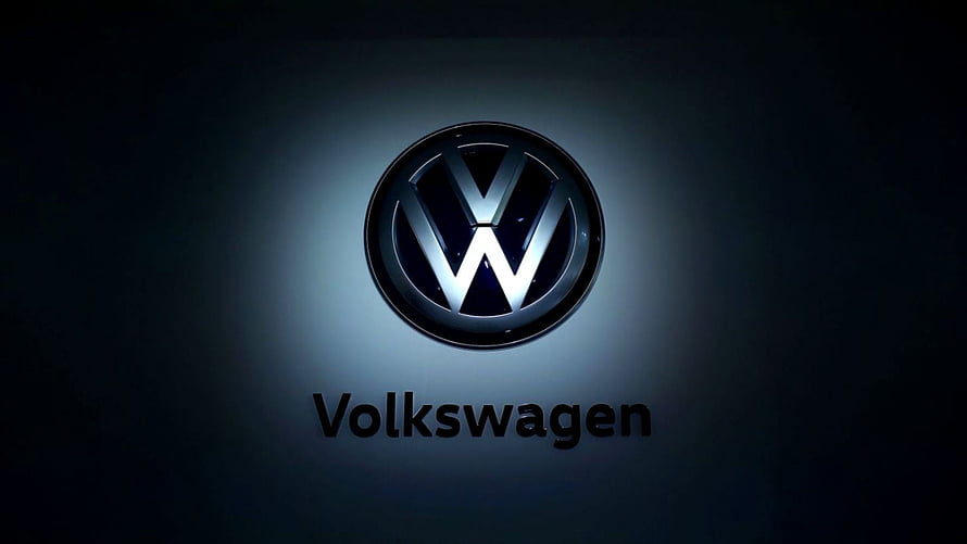 Volkswagen Logo Wallpaper - Sleek VW Emblem on Dark Blue Background HD wallpaper