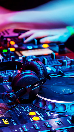 DJ Headphones on Turntable Mixer with Neon Blue and Purple Lighting HD phone wallpaper