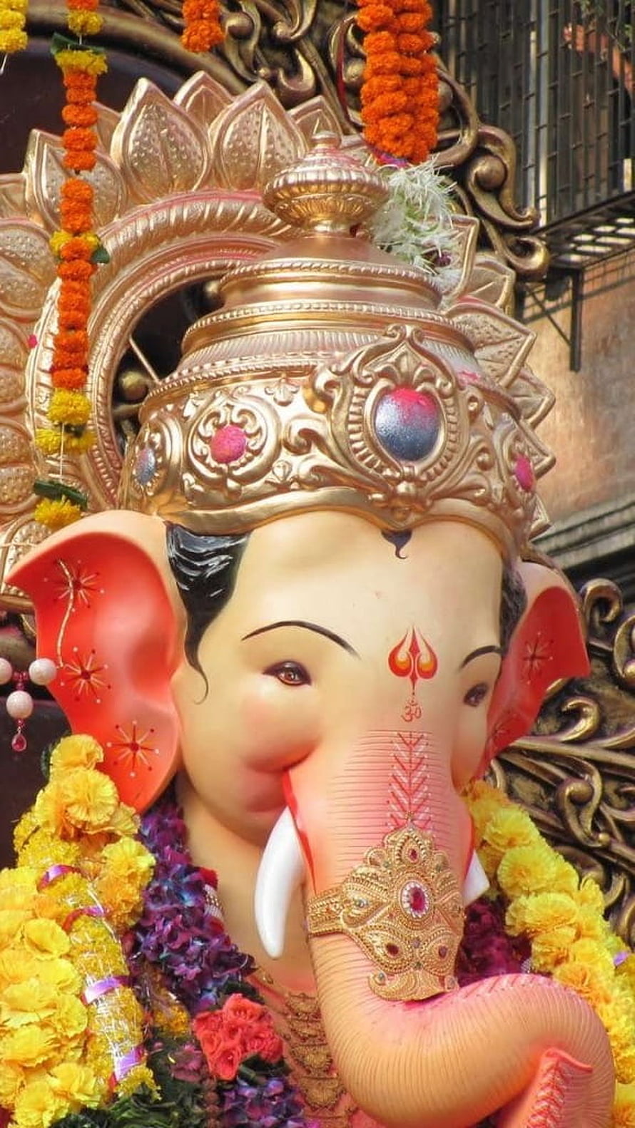 Lalbaugcha Raja Ganesha Murti Adorned With Marigold Garlands And Ornate Golden Crown HD phone wallpaper