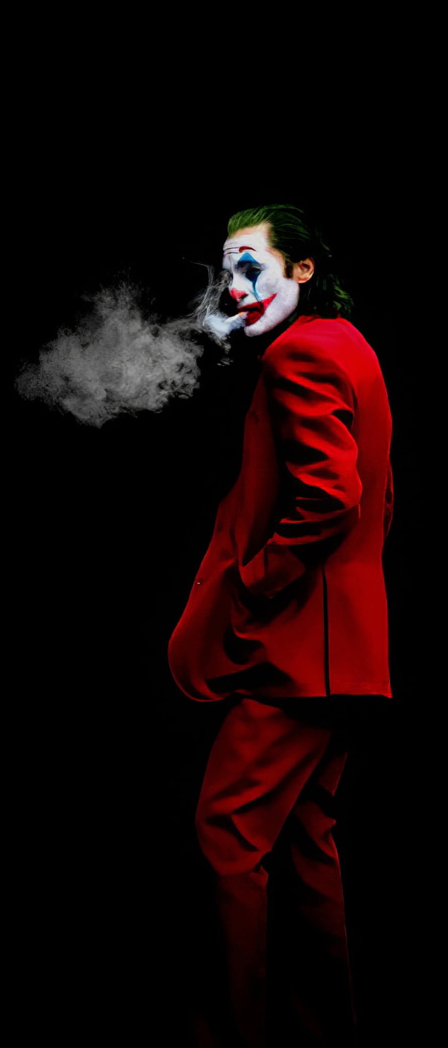Joker in Red Suit Smoking Against Black Background HD phone wallpaper