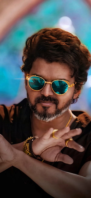 Vijay Sethupathi wearing gold sunglasses and jewelry portrait HD phone wallpaper