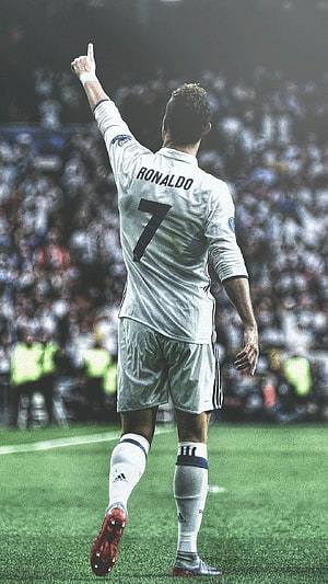 Cristiano Ronaldo in Real Madrid Kit Pointing to Sky During Stadium Celebration HD phone wallpaper
