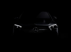 Mercedes-Benz Front View With Glowing LED Headlights In Dark Atmosphere HD wallpaper