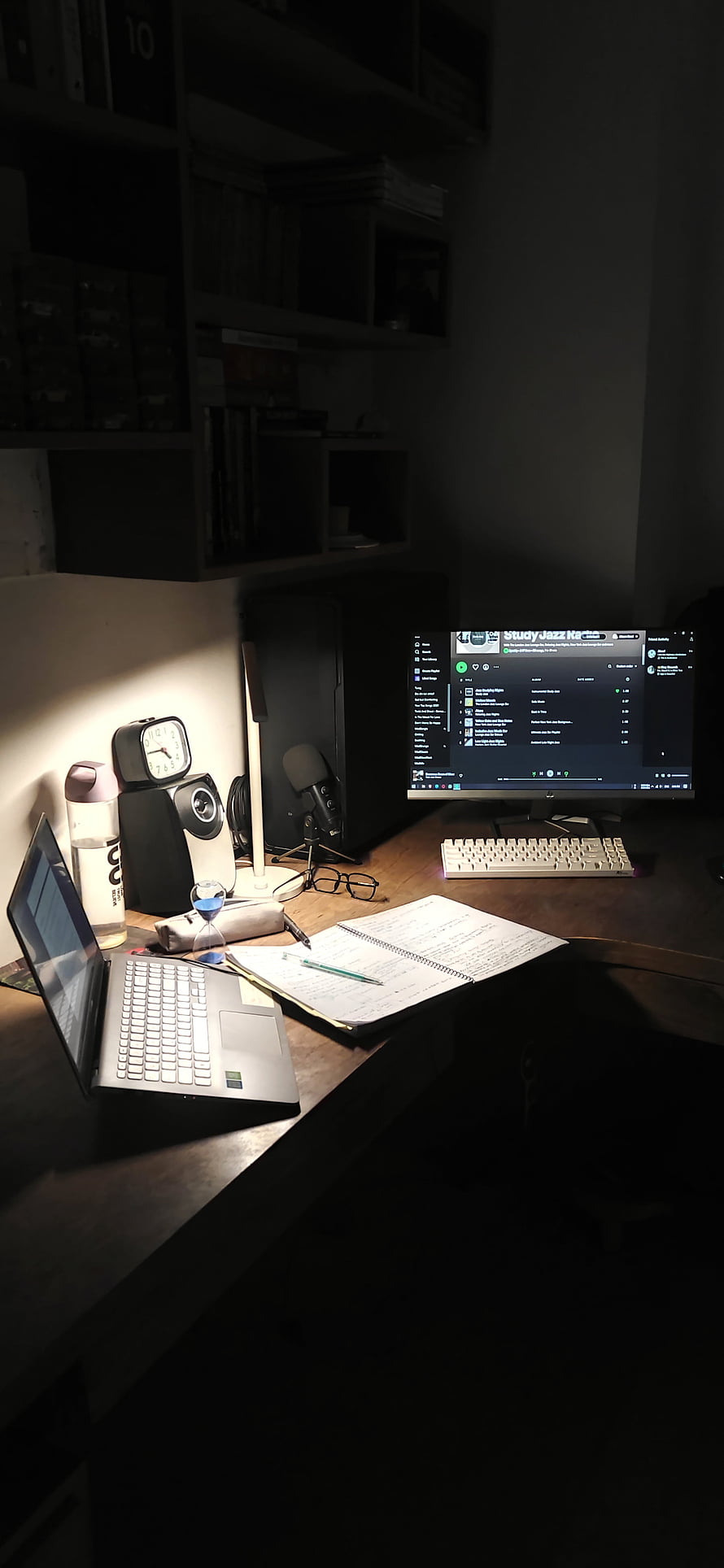 Cozy Night Study Desk Setup with Laptop, Monitor, and Warm Lighting HD phone wallpaper
