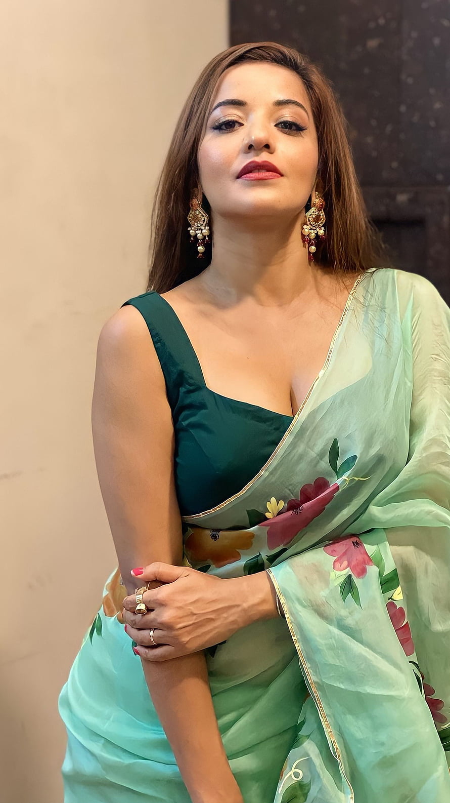 Woman in elegant light green floral saree with dark green blouse and traditional jewelry, Monalisa, bhojpuri actress, saree beauty, cleavage HD phone wallpaper