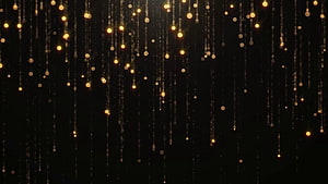 Golden Bokeh Lights Falling on Black Background HD wallpaper