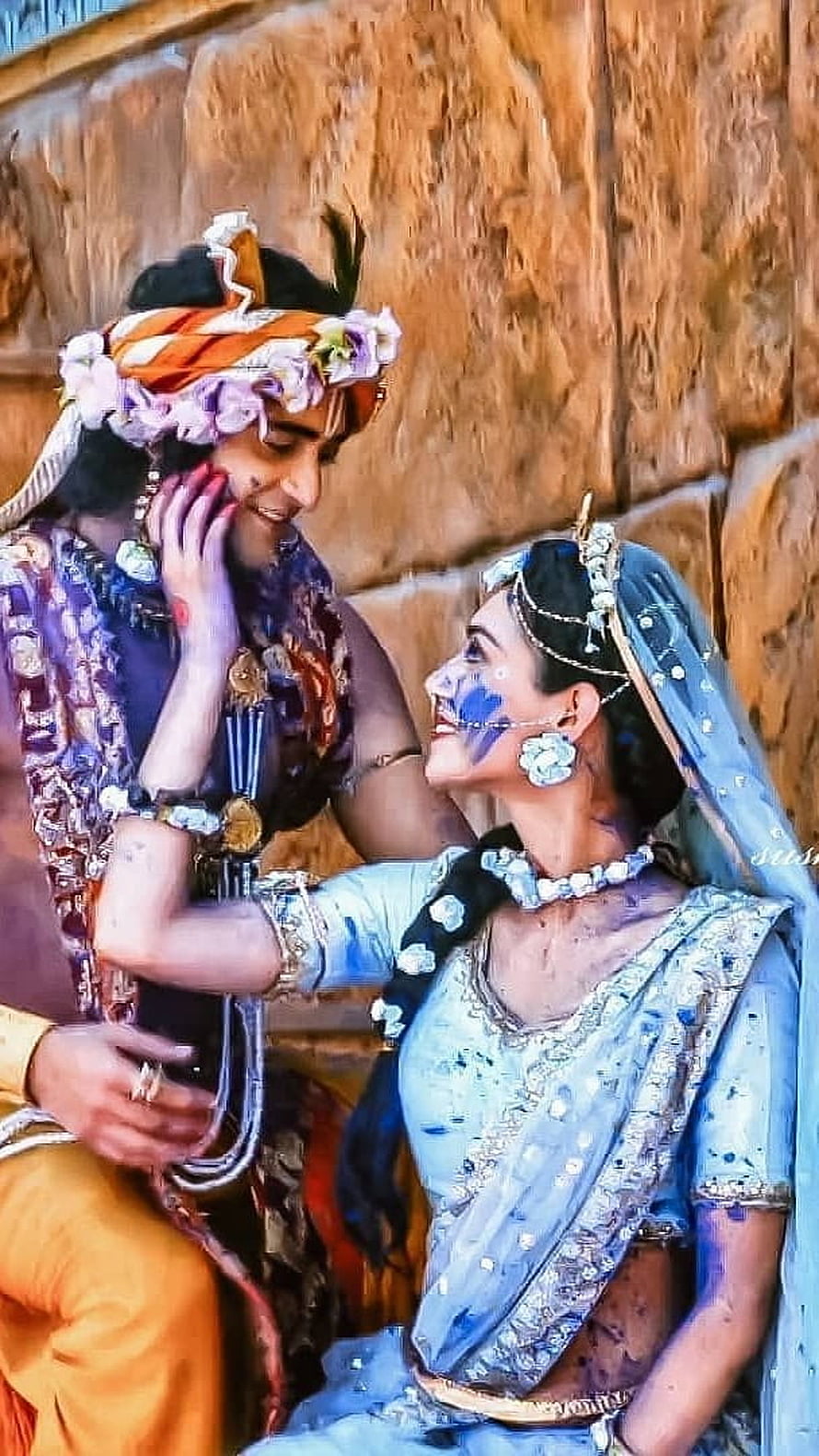 Radha and Krishna in traditional attire sharing a romantic moment with floral jewelry and blue skin, Radha Krishna Serial , Holi, Love, Radha Krishna HD phone wallpaper