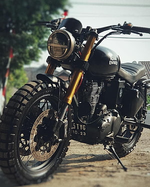 Black Royal Enfield Meteor 350 Custom Bobber Motorcycle with Gold Forks HD phone wallpaper