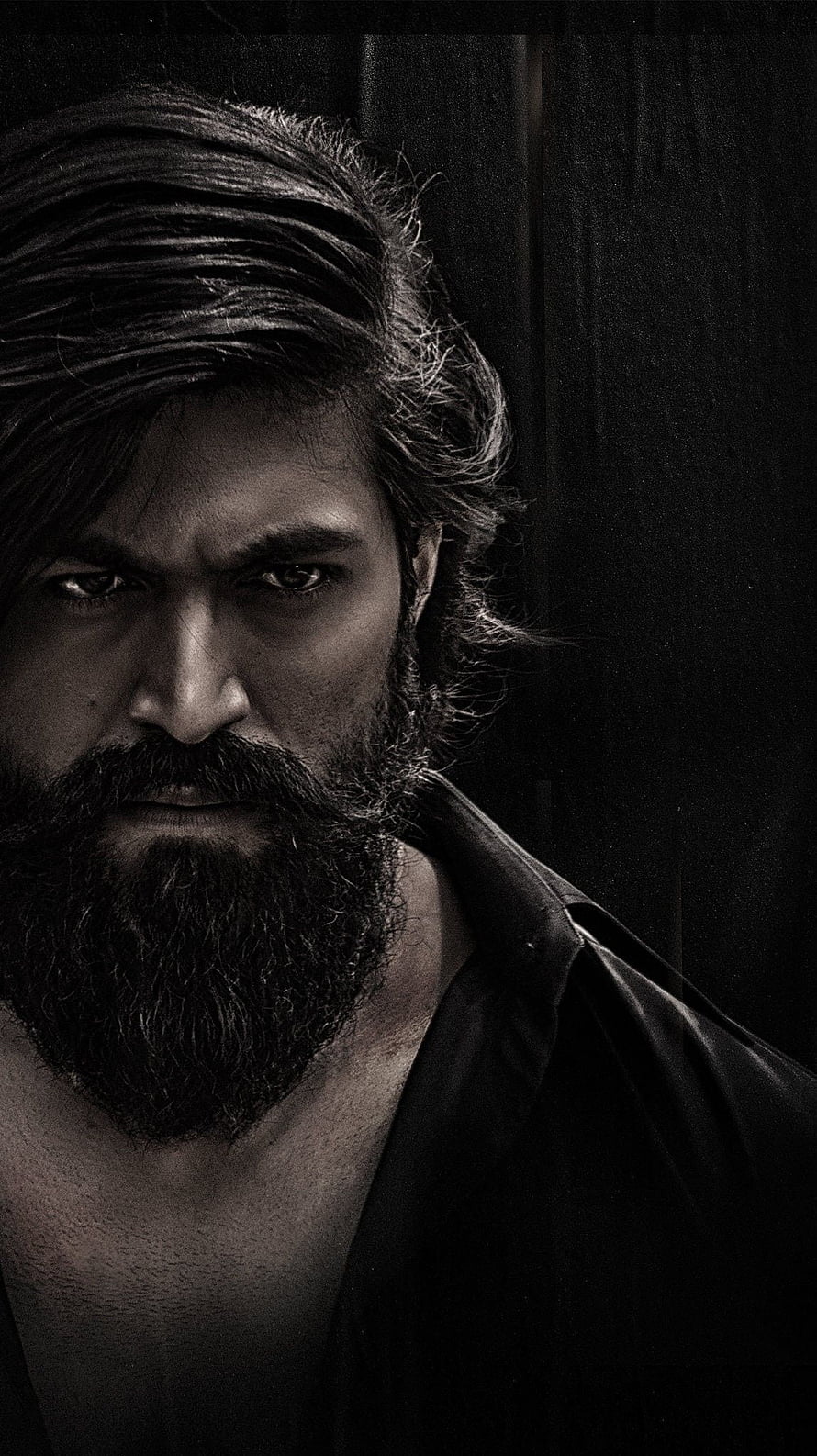 Allu Arjun intense black and white portrait with beard and serious expression HD phone wallpaper