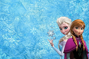 Elsa and Anna from Frozen Creating Ice Snowflakes on a Frosty Blue Winter Background HD wallpaper