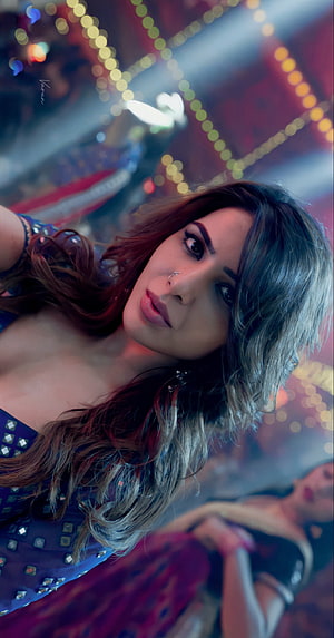 Kiara Advani in a blue outfit with bokeh lights background HD phone wallpaper