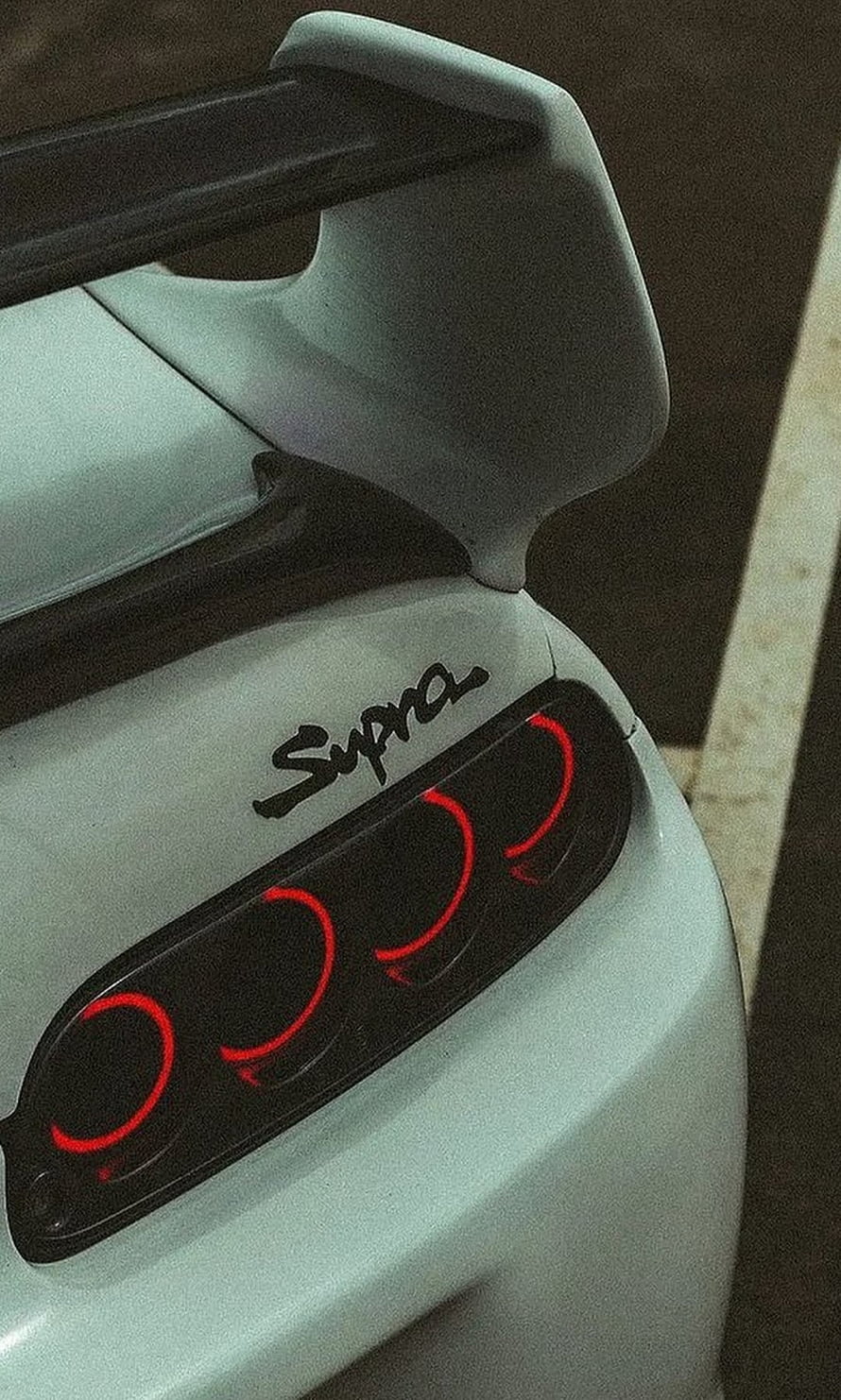 White Toyota Supra Rear Spoiler and Iconic Triple Red Taillights Close-Up HD phone wallpaper